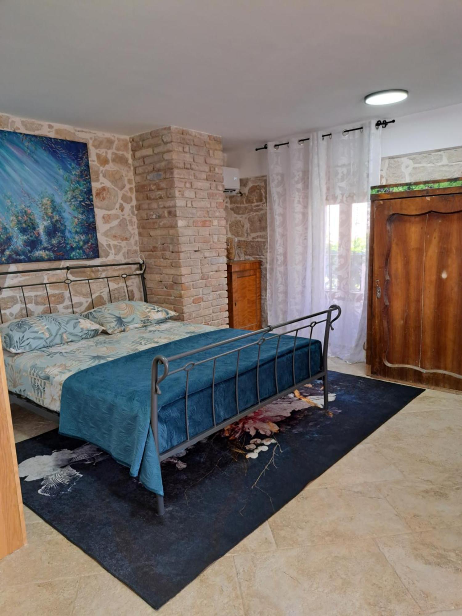 Jardin Kapetanova Kuca Apartamento Veli Iž Exterior foto