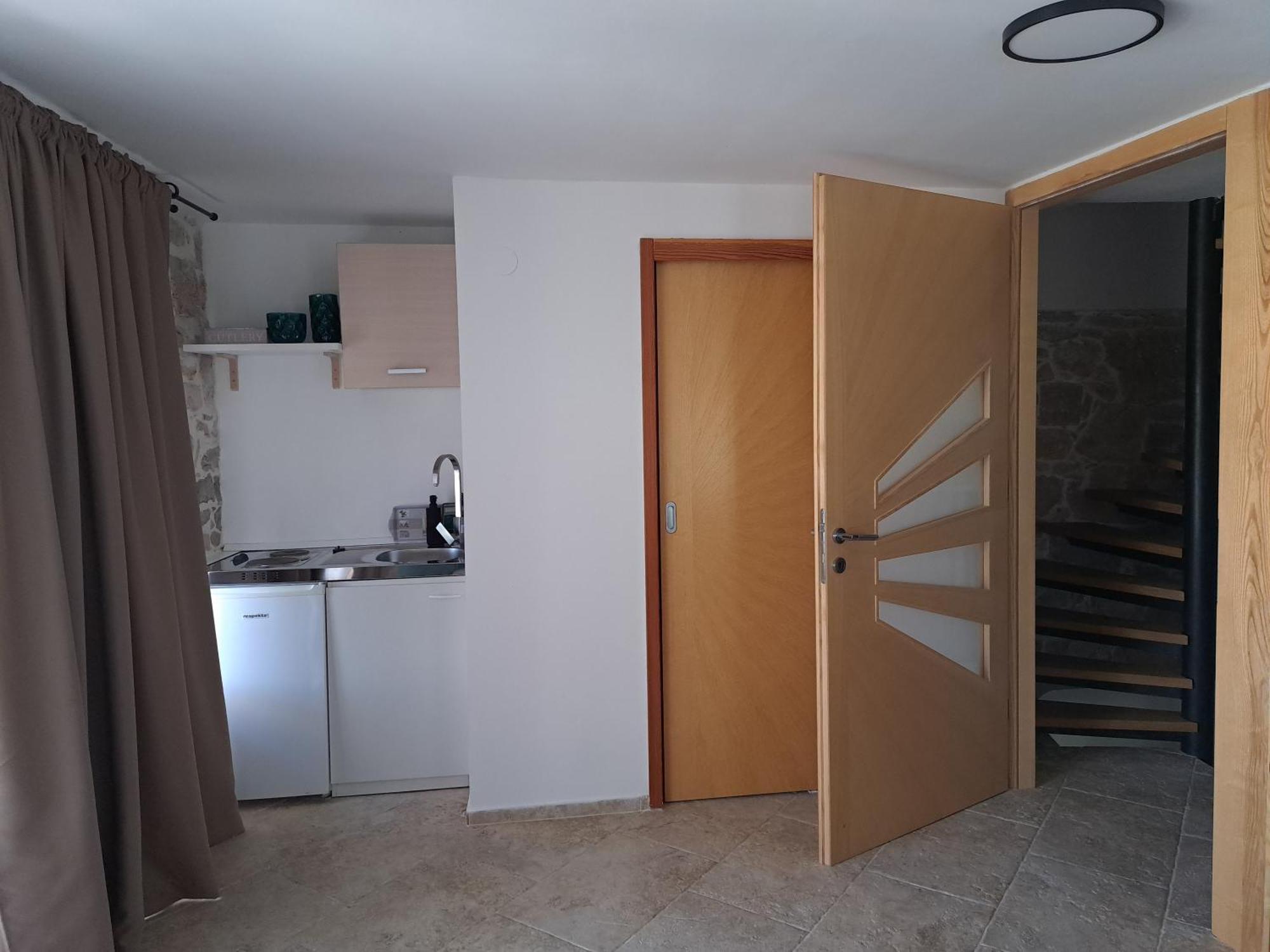 Jardin Kapetanova Kuca Apartamento Veli Iž Exterior foto